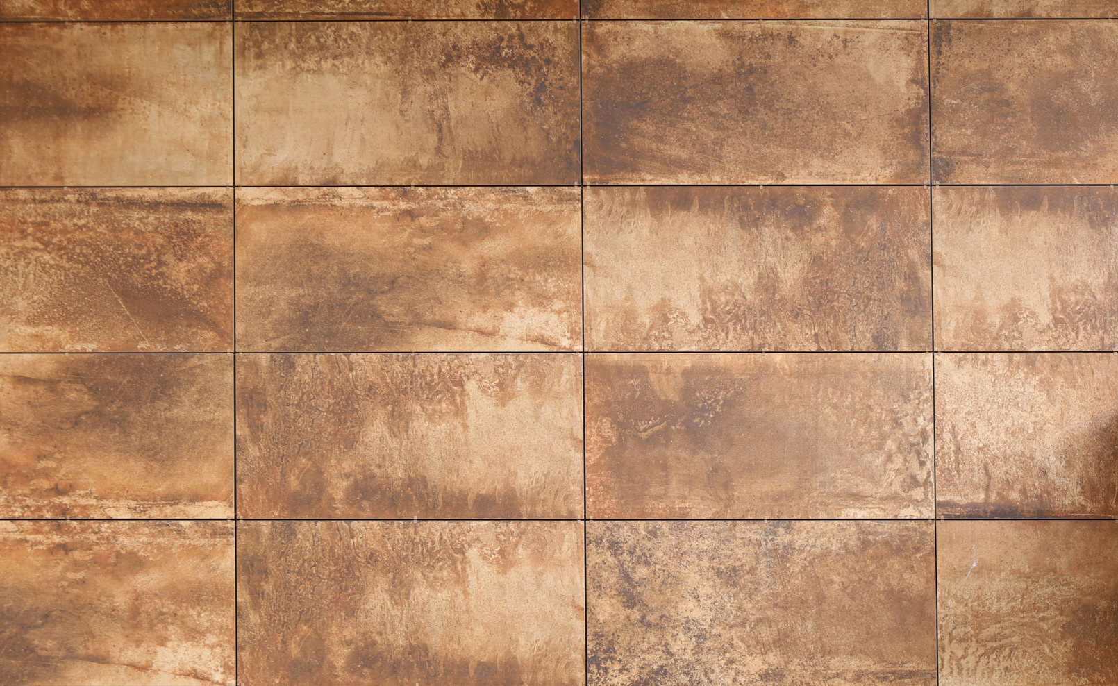 Brown stone panels for ventilated walls or facades.